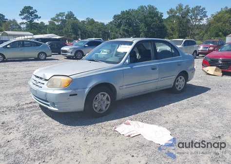 2004 Hyundai Accent Gl from USA, damaged, VIN KMHCG45C34U499258